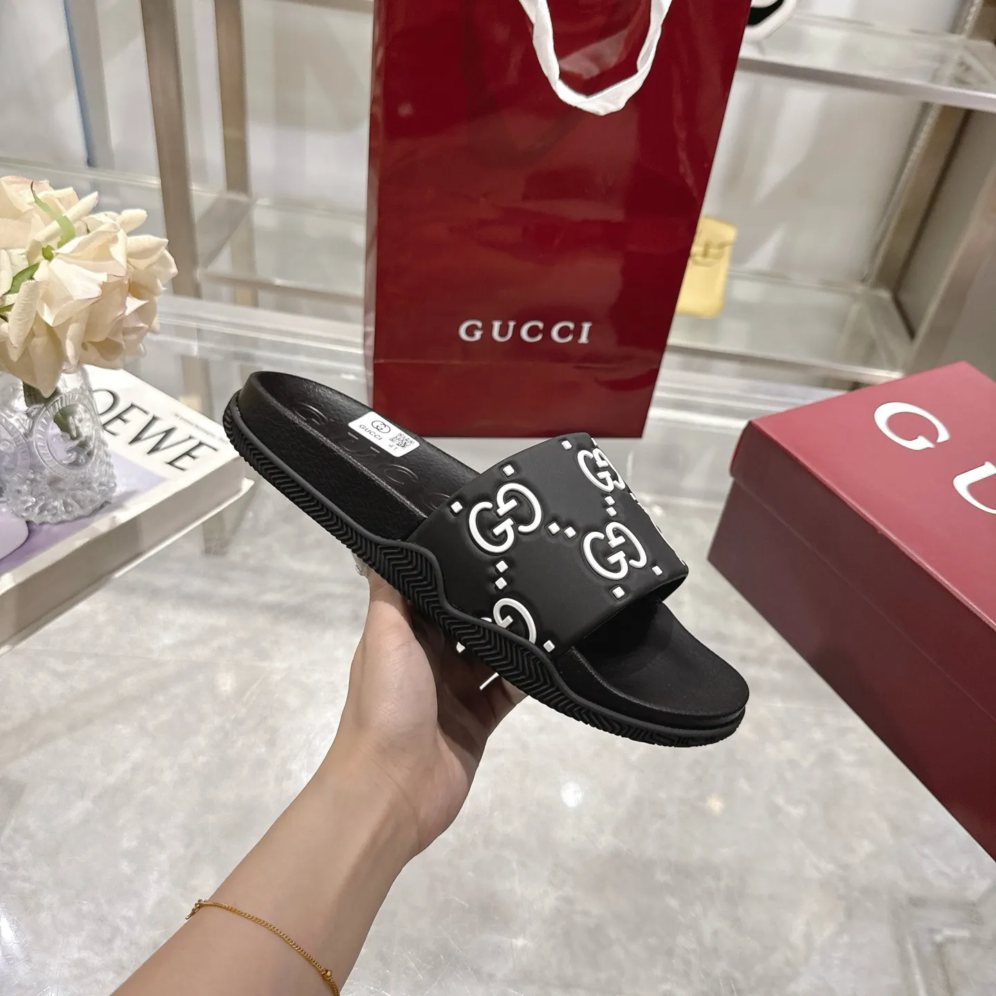 🅿️300💰 🌹Gucci official website Good Game slippers and sandals for men and women. In this special edition series, the acronym of the brand founder Guccio Gucci gives new meaning. In the gaming world, "GG" is a symbol of good sportsmanship and stands for "Good Game," which conveys the value system of the community. The modern acronym is a playful ode to the brand’s origins in the world of sports and leisure, illustrating how Gucci’s heritage continues to evolve. The parting greeting expresses the Gucci Good Game motto as the brand moves into new worlds, creating centers of play, self-expression, talent, freedom and individuality. Made with a rubber upper, these slippers are embellished with the collection's signature logo.  Rubber upper, unisex, G logo embossed, molded footbed, rubber sole, flat, made in Italy, sizes 36 to 46
